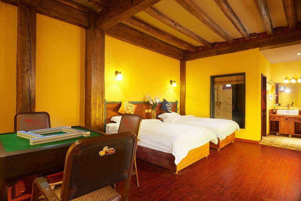 Jiumi Snow Mountain Original Art Hotel แชงกรีลา ภายนอก รูปภาพ